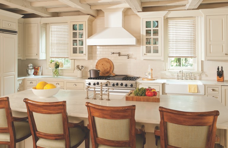 Kitchen windows covered with blinds